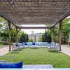 covered grass area with seating