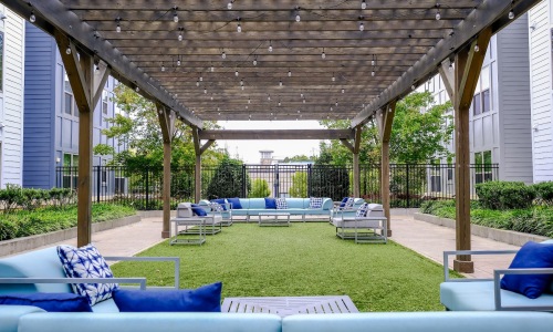 covered grass area with seating