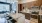 a kitchen with wooden cabinets