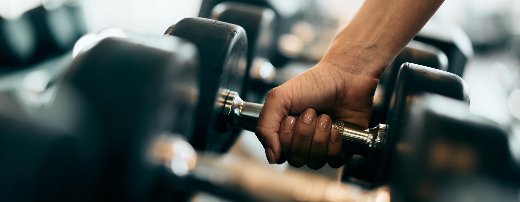 close-up of a hand holding a weight