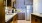 a kitchen with black cabinets