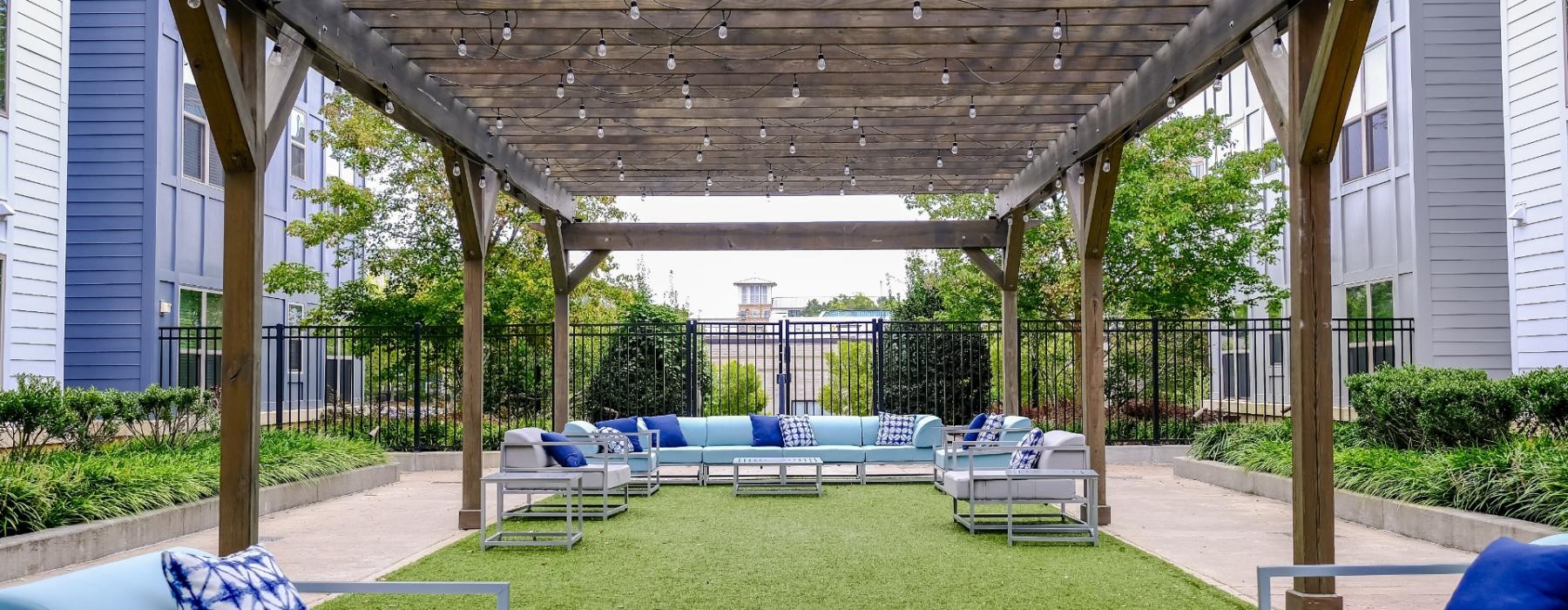 a deck with a pool and chairs