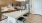 a kitchen with a marble island